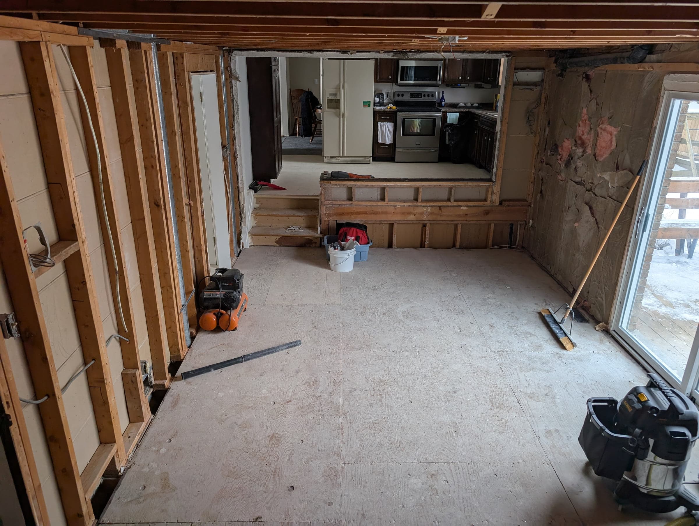 Interior room under renovation with open wall framing